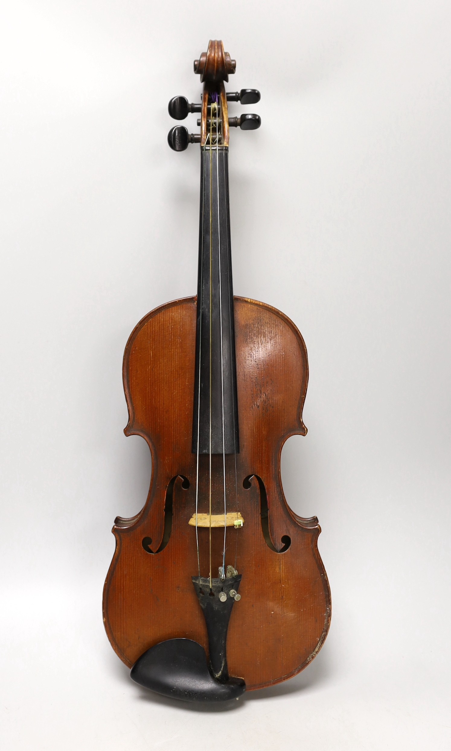 A cased French double backed violin, interior label reads ‘Copie de J.B. Vuillaume à Paris.’ Back measures 36cm excluding button